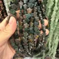 Macro detail view of 8mm star-shaped natural stone beads for handmade DIY jewelry making - 8mm (Approx 56 Beads Per Strand) / India Agate