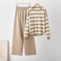 Detail shot of the beige striped long sleeve knit pullover and matching wide leg trousers outfit. - One Size / Set / Camel