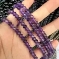 Close-up of high quality 3x5mm faceted purple amethyst abacus spacer beads for DIY jewelry. - 85 Pieces/Pack / Purple Crystal