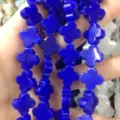 Deep blue natural stone four-leaf clover loose beads for DIY jewelry making - 14x14x5mm (Approx 28 Units) / Sapphire Blue