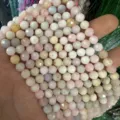 Cuentas redondas facetadas de ágata natural de 6mm para accesorios de joyería artesanal - Aprox. 62 Cuentas/Tira / 6mm / Morganita AB+