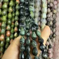 Facettierte Tropfenperlen aus Naturstein für DIY-Schmuck in verschiedenen Farben und Mustern - Grün gemusterter Stein