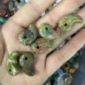 Macro detail of comma-shaped natural unakite stone pendants for DIY jewelry making - 1 Piece (18*30mm) / Unakite