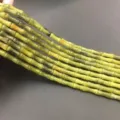 Close-up of green natural olivine jade bamboo joint tube beads for DIY craft making - Approx 32 Beads Per Strand / Olive Green Bamboo