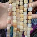 Detailed view of square natural stone agate beads with side grooves for DIY jewelry - 10*10*5mm (Approx 32 Beads Per Strand) / Pink Aventurine
