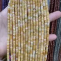 Vista detallada de cuentas rondelle de piedra natural amarilla tallada 2x4mm para joyas DIY - 2*4mm (Aprox. 38cm Hilo) / Jade Amarillo Natural