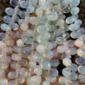Détail des perles facettées en forme de goutte d'opale pour accessoires bijoux DIY - 6x9mm (44 Pièces/Fil) / Opalite