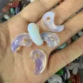 Close-up view of opalescent magatama comma-shaped stone pendants for DIY jewelry making. - 1 Piece (13*23mm) / Synthetic Opal