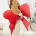 Joli coussin en forme de nœud rouge oreiller en velours doux pour canapé lit chambre décoration maison. - 43*70 cm / Rouge