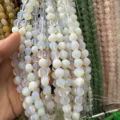 Vue détaillée de perles d'opalite semi-translucides et quartz rose pour bijoux faits main - 6x10mm (40 Pcs) / Opale