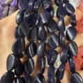 Macro di perline ovali in pietra di sabbia blu scintillante per gioielli fai da te - Pietra di sabbia blu