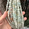 Close-up detail of 8mm star-shaped light green natural stone beads for DIY jewelry - 8mm (Approx 56 Beads Per Strand) / Amazonite