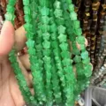 Detailed macro view of 8mm star-shaped green aventurine stone beads for jewelry making - 8mm (Approx 56 Beads Per Strand) / Malay Jade