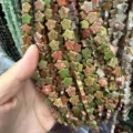 Macro view of 8mm star-shaped Unakite stone beads for DIY jewelry making accessories - 8mm (Approx 56 Beads Per Strand) / Unakite