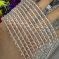 Close-up of clear white quartz crystal round loose beads for DIY jewelry making - One Strand (Approx 120 Beads) / 3mm / Synthetic Clear Quartz