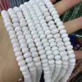Close-up of white natural stone abacus beads for DIY jewelry making and beading - Approx. 70 Pcs/Strand / White (45)