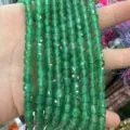 Macro view of 6mm faceted green natural stone agate cube beads for DIY jewelry making - 6mm (Approx 65 Pieces/Strand) / Green Agate