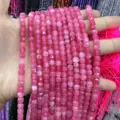 Hand holding 6mm pink faceted natural stone cube beads for DIY crystal agate crafts - 6mm (Approx 65 Pieces/Pack) / Peach Red
