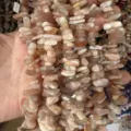 Natuurlijke perzik maansteen onregelmatige lange tand chip kralen voor DIY sieraden - Ongeveer 38cm Per Streng (10-25mm) / Zonnesteen