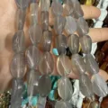Perle ovali in pietra naturale grigia traslucida con fori dritti per collane e bracciali fai da te - 11*16mm (Circa 12 Pezzi) / Agata Grigia