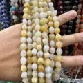 Brins de perles en pierre naturelle irrégulière jaune et blanc pour la création de bijoux - Topaze