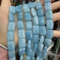 Natural light blue stone beads in rectangular double-arc shape for DIY jewelry making. - Enhanced Aquamarine