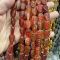 Close-up of natural carnelian leaf-shaped loose beads for DIY jewelry making - 10x14x6 (15 Beads Per Strand) / Red Agate
