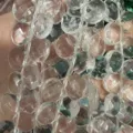 Detailed macro view of faceted clear heart-shaped natural stone beads for DIY jewelry - Heart / 13x13x6mm (Approx 27 Pcs/Strand) / White Crystal
