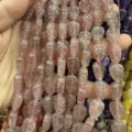 Macro view of natural strawberry quartz leaf beads for DIY jewelry - 10x14x6 (15 Beads Per Strand) / Strawberry Quartz