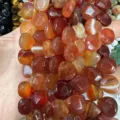 Detailed macro view of faceted natural carnelian agate beads for DIY jewelry making - Heart / 13x13x6mm (Approx 27 Pcs/Strand) / Red Agate