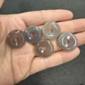 Close-up detail of smooth grey natural agate stone doughnut charms for DIY jewelry making - 10 Pieces/Pack / Grey Agate