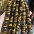 Macro view of 4x12mm natural tiger eye stone spacer beads with polished finish - Round Spacer Beads Strand / 8x3mm (Approx 58 Pcs/Strand) / Tiger Eye