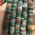 Close-up view of multi-colored natural stone wheel spacer beads for DIY jewelry making. - Round Spacer Beads Strand / 8x3mm (Approx 58 Pcs/Strand) / India Agate