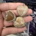 Macro view of 25mm heart-shaped natural stone pendants with unique stripe patterns - 25*6mm / Picture Jasper