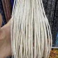 Close-up of 2x4mm white natural stone cylinder beads strands - Howlite (Tube) / 2*4mm (Approx. 38cm Strand)