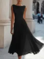 Elegant cowl neck detail and pleated skirt silhouette showcased in a chic urban street scene. - 3XL / Black