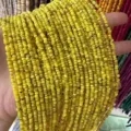 Macro detail of 3mm natural yellow shell spacer beads for DIY jewelry making accessories - 3mm (Approx. 39cm Per Strand) / Light Yellow