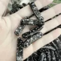 36x10mm Naturstein Brückenperlen schwarz-weiß gepunktet für DIY Schmuckherstellung - Schneeflocke