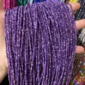 Hand holding multiple strands of 2mm purple round shell loose beads for DIY jewelry making - 2mm (Approx. 38mm Strand) / Purple(9)
