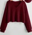 Dettaglio top corto a maniche lunghe con scollo a V in maglia waffle bordeaux con tessuto. - Taglia S / Borgogna