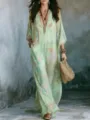 Nahaufnahme des Vintage-Blumendruck-Maxikleids, leichtes Material und eleganter Fall. - S / Grün