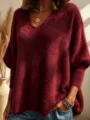 Detail view of a cozy burgundy V-neck fuzzy knit long sleeve sweater with relaxed fit. - Burgundy