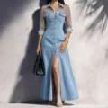 Elegant denim long dress featuring sheer mesh long sleeves, lapel collar, and front slit design. - S / Light Blue