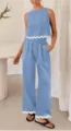 Detail shot of the women casual two piece set with sleeveless top and loose pocket pants. - Light Blue