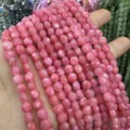 Vue détaillée de perles rondes plates en pierre naturelle rose facettées de 6mm pour bijoux DIY - Pierre Rouge Pêche / Env. 6mm (Env. 62 Pièces/Brin)