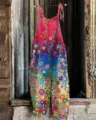 Close-up detail of colorful printed cotton linen strap jumpsuit showing abstract floral pattern. - S / Set / 031