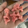 Detailed view of pink shell powder morning glory beads for DIY jewelry crafts handmade - 12x14mm / Orange Pink