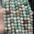 Detailansicht von facettierten Natursteinperlen in Hellgrün und Pastelltönen für DIY-Schmuck. - 2.0mm / Ca. 170 Stück/Strang / Natürlicher Amazonit