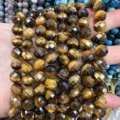 Detaillierte Makroansicht von facettierten Tigerauge-Natursteinperlen für DIY-Schmuckhandwerk - Natürlicher Tigerauge Stein