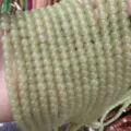 Detailed view of pale green translucent natural stone beads for DIY jewelry making - 5*6mm (Approx. 72 Pieces/Pack) / Water Green